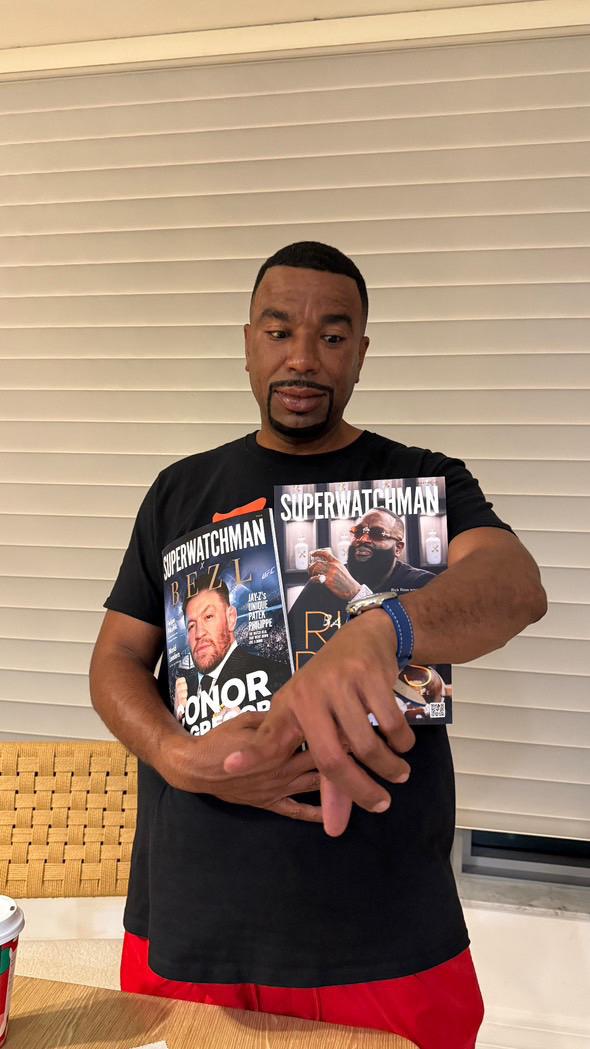 N.O.R.E. holding Superwatchman Magazine